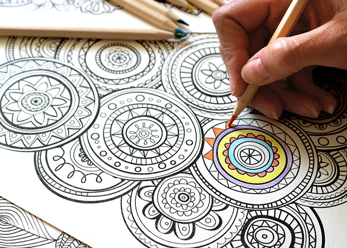 Colouring-Therapy-Mindful Close up of person colouring a printed drawing